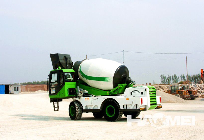 Self-loading concrete mixer