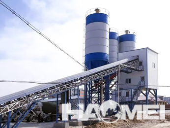 Encapsulated concrete mixing station