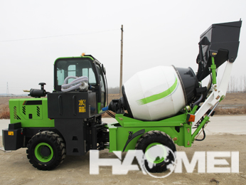 Self-loading concrete mixer for mixing dry hard concrete